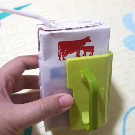 Adjustable No Squeeze Juice Box Holder